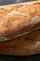 Image showing close up of baguette bread on table