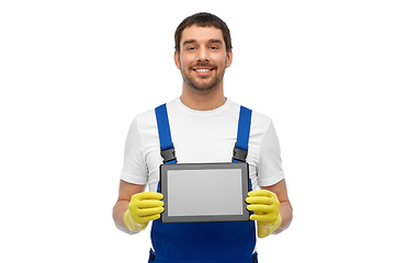 Image showing happy male worker or cleaner showing tablet pc