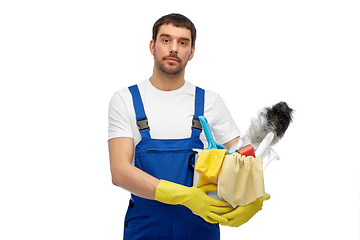 Image showing male cleaner in overall with cleaning supplies