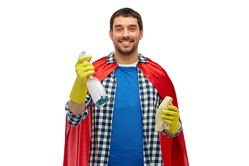 Image showing smiling man in superhero cape with rag and cleaner