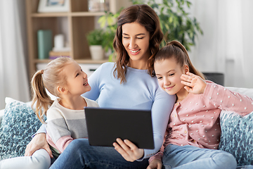 Image showing mother and children having video call on tablet pc