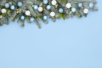 Image showing Festive Christmas Background with Snow Fir and Tree Baubles