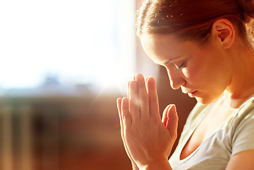 Image showing close up of woman meditating at yoga studio