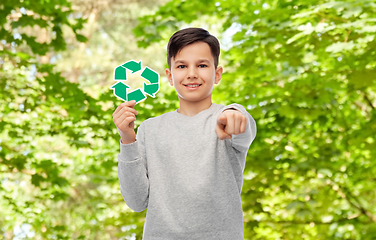 Image showing happy boy with recycling sign pointing to you