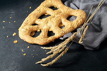 Image showing close up of cheese bread on kitchen table