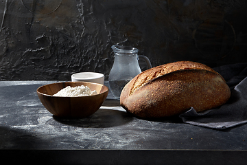 Image showing bread, wheat flour, salt and water in glass jug