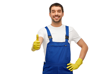 Image showing happy male worker or cleaner in overall and gloves