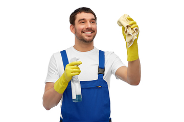 Image showing male cleaner cleaning with rag and detergent