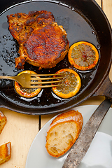 Image showing pork chop seared on iron skillet