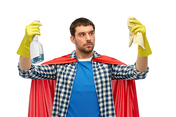 Image showing man in superhero cape with rag and cleaner