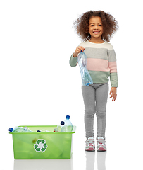 Image showing happy african american girl sorting plastic waste