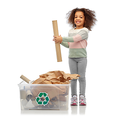 Image showing smiling african american girl sorting paper waste