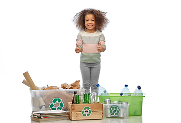 Image showing happy girl sorting paper, metal and plastic waste