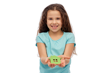 Image showing smiling little girl holding green house icon