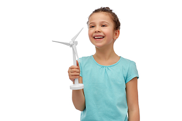 Image showing smiling girl with toy wind turbine