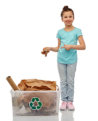 Image showing smiling girl sorting paper waste