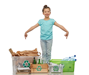 Image showing happy girl sorting paper, metal and plastic waste