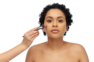 Image showing woman and hand of make up artist with brush