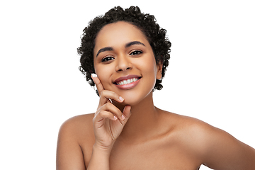 Image showing young african american woman with moisturizer