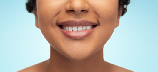 Image showing close up of face of smiling african american woman