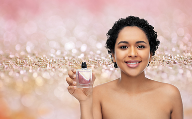 Image showing young african american woman with perfume