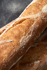 Image showing close up of baguette bread on kitchen towel