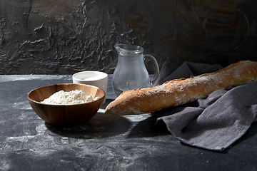 Image showing bread, wheat flour, salt and water in glass jug