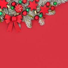 Image showing Christmas Festive Red Background Border with Tree Decorations