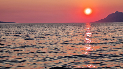 Image showing Beautiful red sunset over the Adriatic sea. Makarska Riviera-Biokovo, Dalmatia, Croatia, Europe