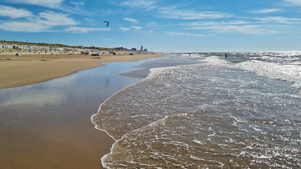 Image showing View to the North Sea city beach on a sunny summer weekend. Typical pavilions. Zandvoort, Netherlands