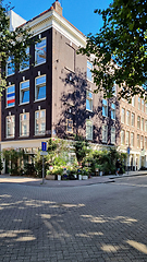 Image showing Typical houses in Amsterdam Netherlands. Old European city summer landscape