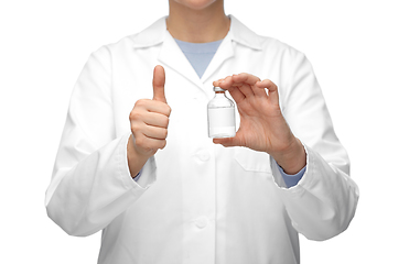 Image showing close up of doctor with medicine showing thumbs up