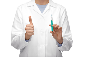 Image showing close up of doctor with syringe showing thumbs up