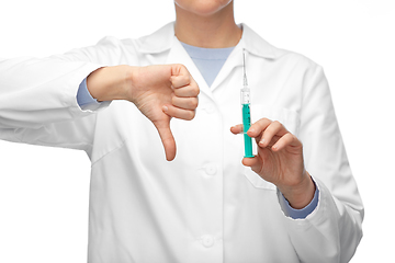 Image showing close up of doctor with syringe shows thumbs down