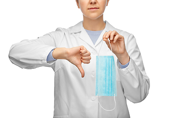 Image showing female doctor with mask showing thumbs down