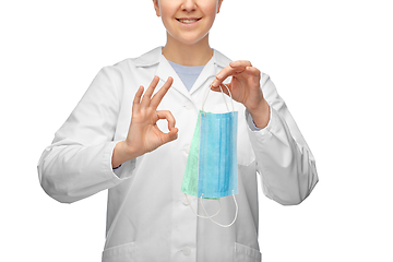 Image showing smiling doctor with two masks showing ok sign