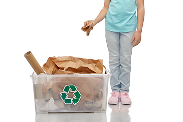 Image showing smiling girl sorting paper waste