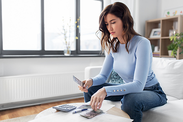 Image showing woman counting money at home