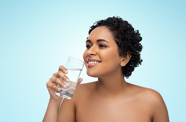 Image showing young african american woman with glass of water