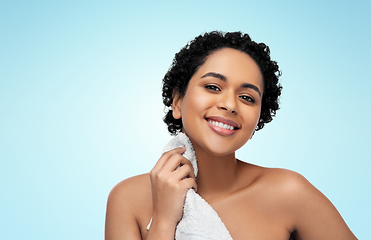 Image showing young african american woman with bath towel