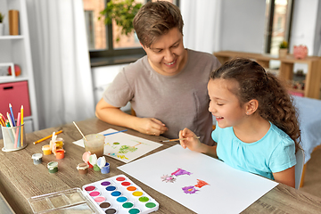 Image showing happy father with little daughter drawing at home