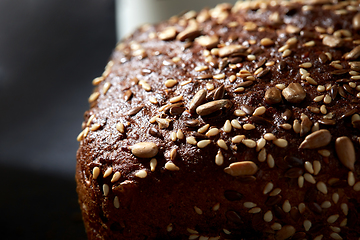 Image showing homemade craft bread with seeds on table