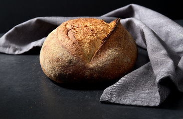 Image showing homemade craft bread on table