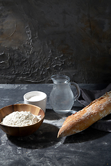 Image showing bread, wheat flour, salt and water in glass jug