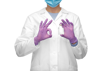 Image showing close up of doctor with medicine showing ok sign