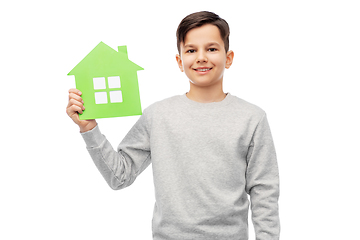 Image showing smiling boy holding green house icon