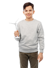 Image showing smiling boy with toy wind turbine