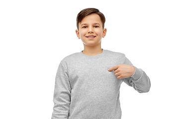 Image showing happy smiling boy pointing fingers at himself