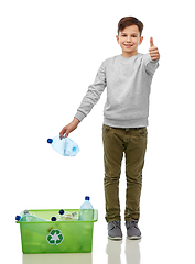 Image showing smiling boy sorting plastic waste