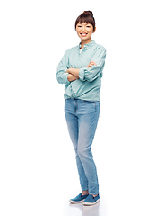 Image showing happy asian woman with crossed arms